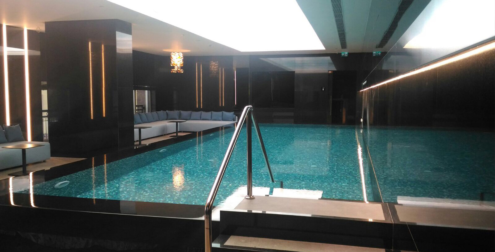 "Lagoon of Opulence: Sauna Dekor's Lugano Pool, Where Design Meets Liquid Luxury