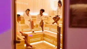 people relaxing inside infrared sauna 1809393246 66e0314dd609b Sauna Dekor Spa Solutions Construction and Installation